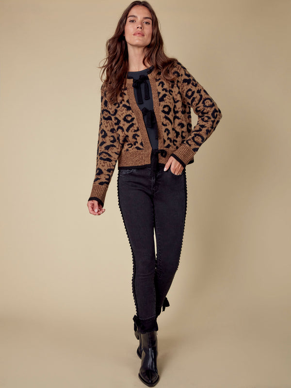 Elegant animal print cardigan crafted with a unique bow tie closure for a trendy look by Charlie B.