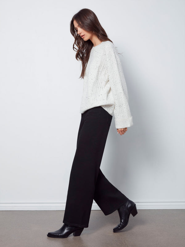 Stylish white crew neck sweater with wide cuffs and unique speckled detailing by Charlie B.