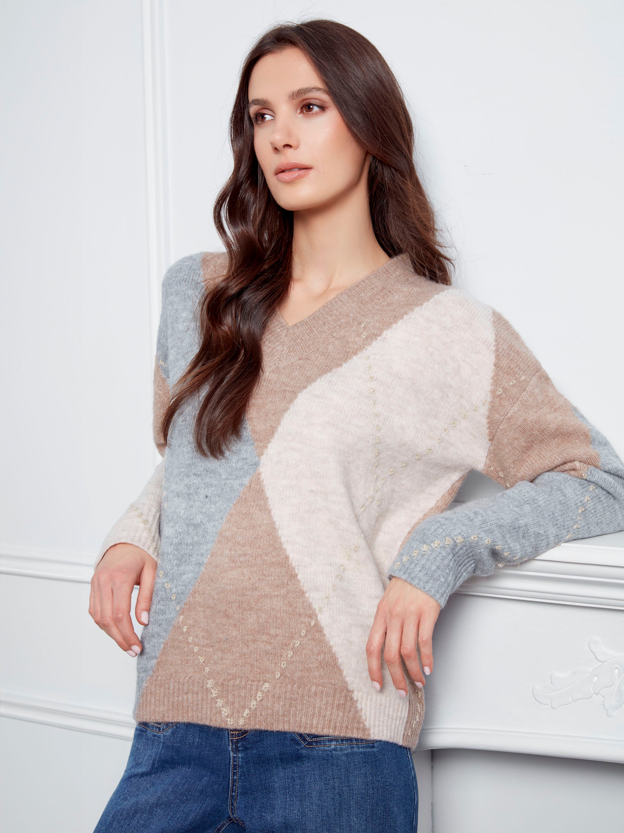 Stylish V-neck sweater in Heather Sesame with an eye-catching argyle design and comfortable fit by Charlie B.