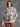 Enjoy the plushy feel of this fashionable ecru plaid knit jacket, perfect for cooler days by Charlie B.