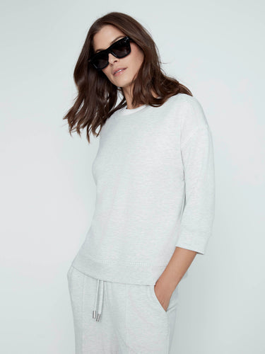 Soft and stylish top with a crew neckline, perfect for casual wear. Enhance your wardrobe effortlessly by Charlie B.