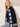Navy long-sleeve cardigan crafted with a distinct crochet pattern by Charlie B.