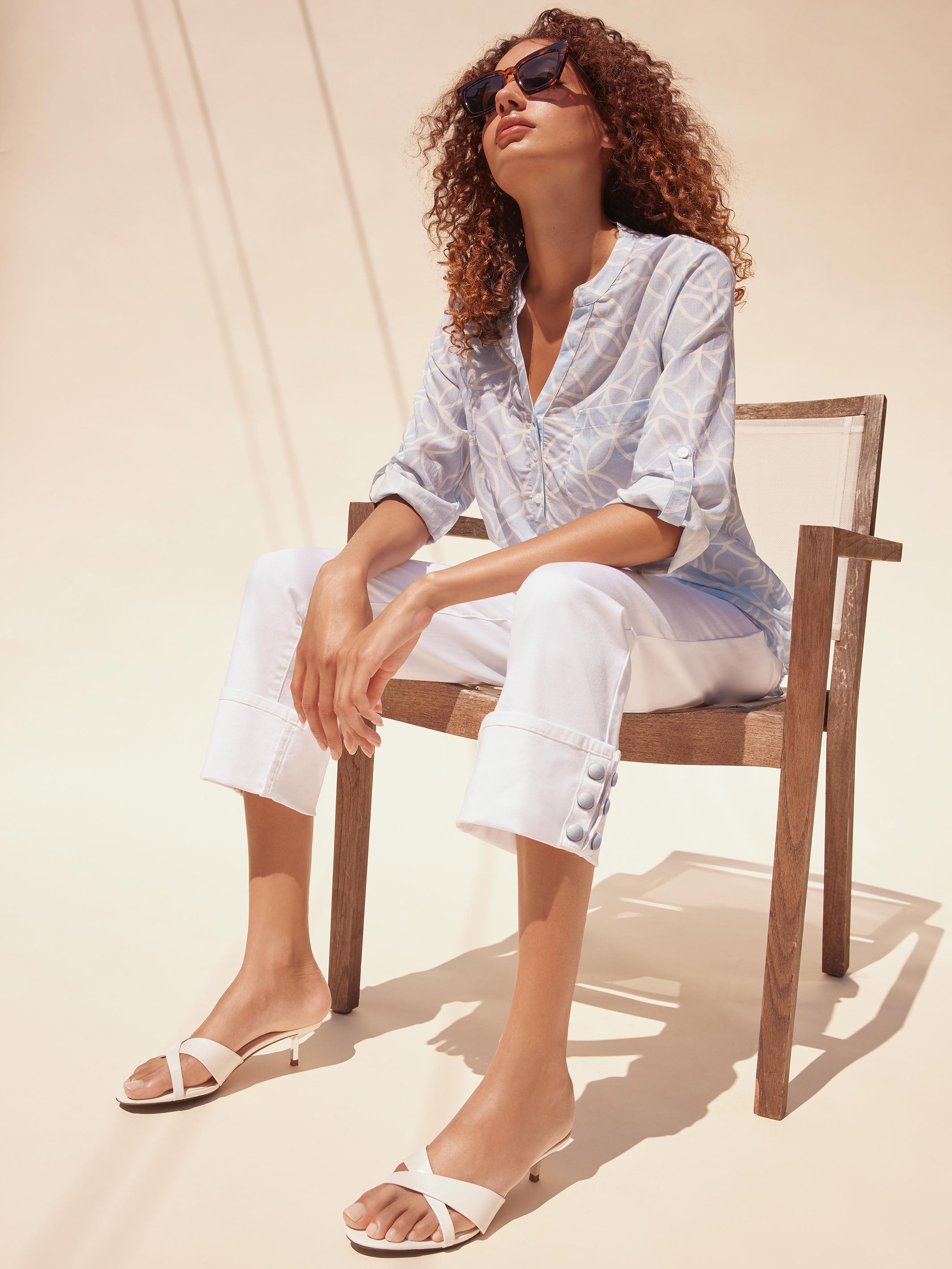 Versatile white cropped length jeans with unique detailing to enhance your wardrobe by Charlie B.
