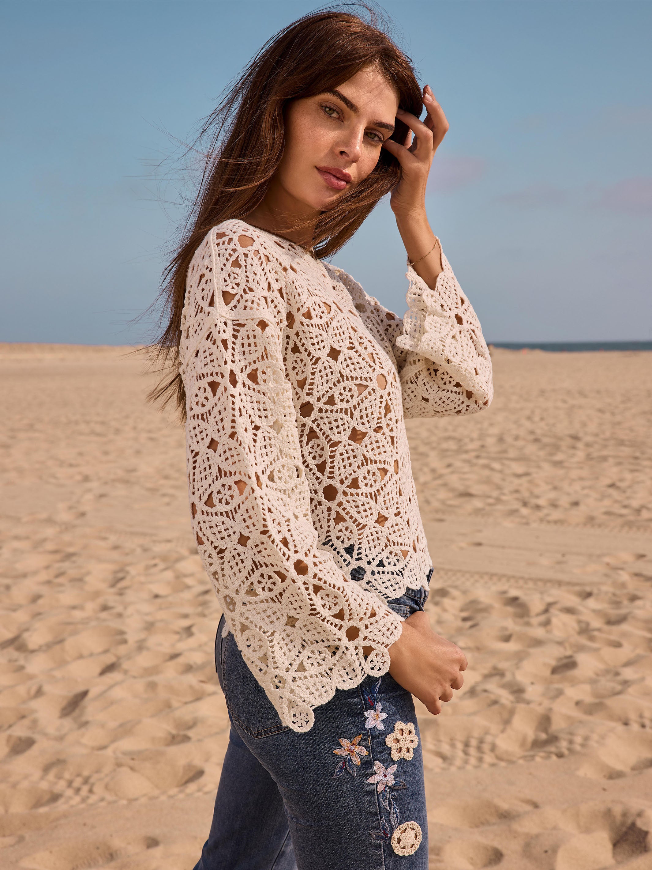 Stylish boatneck complements the intricate design of the top by Charlie B.