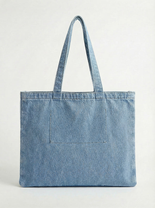 Denim tote bag with comfortable carry handles and a generous handle height of 10 inches. Embossed with the signature logo by Charlie B.