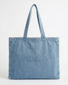 Denim tote bag with comfortable carry handles and a generous handle height of 10 inches. Embossed with the signature logo by Charlie B.