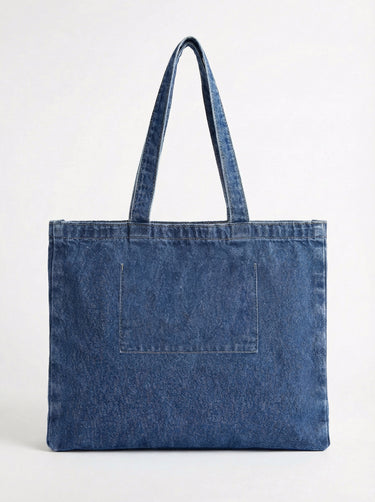 Functional and fashionable denim bag with a handle height of 10" for easy carrying. Made by Charlie B.