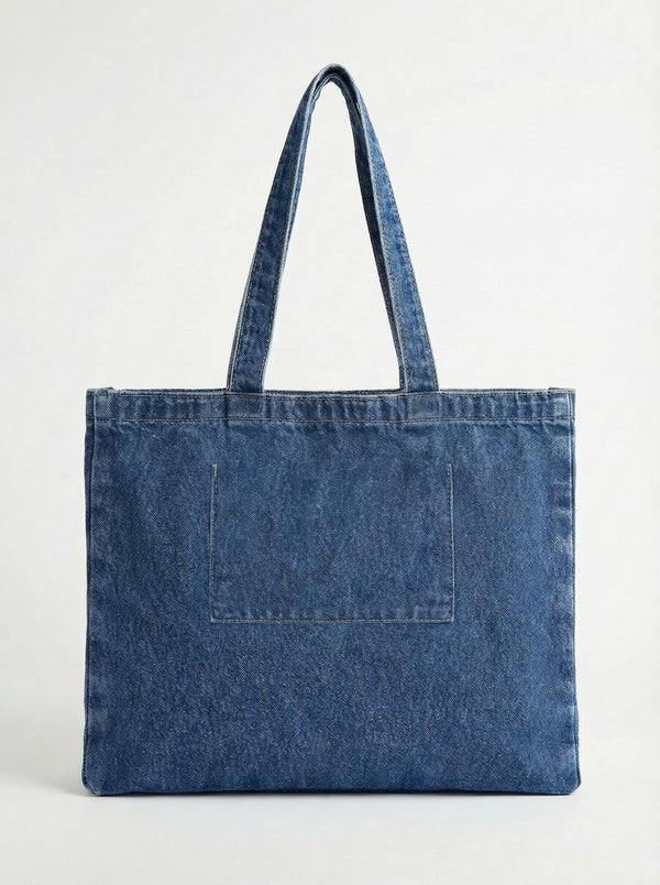 Back view of the denim tote bag made from 100% cotton, ensuring durability and style in every use by Charlie B.