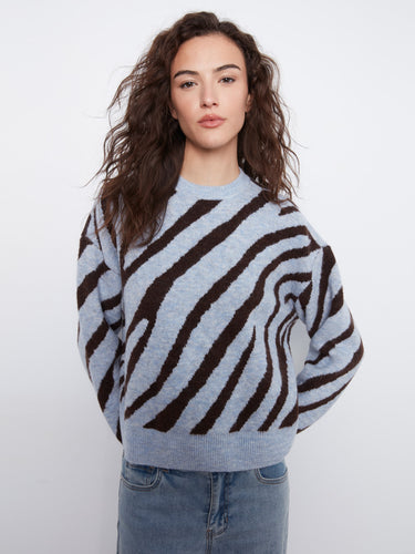 Experience ultimate comfort with the relaxed fit of this trendy striped sweater. By Charlie B.