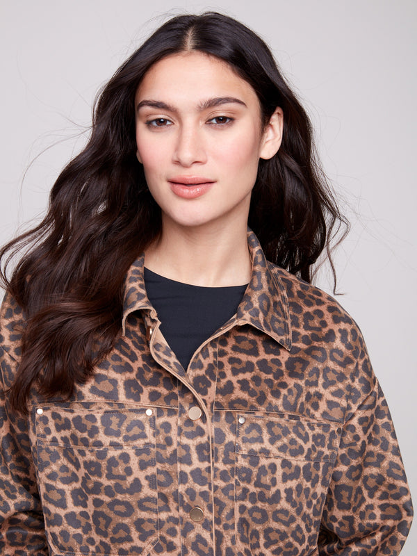 Fashionable leopard print jacket highlighted by patch pockets and elegant button cuffs by Charlie B.