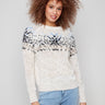 Ecru sweater with a cozy crew neck, featuring intricate jacquard plush knit details by Charlie B.