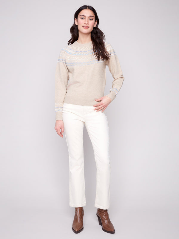 Elegant heather oat sweater with raglan sleeves and intricate geometric design, perfect for versatile styling by Charlie B.