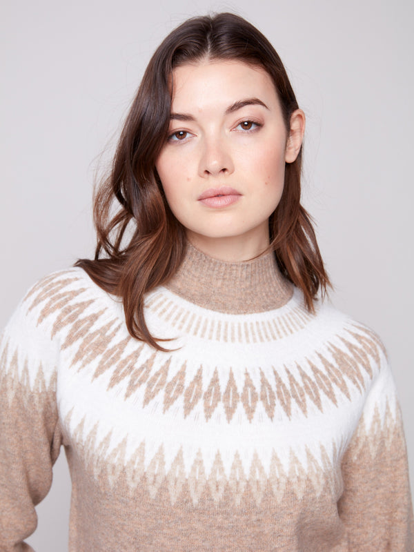 Heather beige sweater showcasing a geometric jacquard pattern, designed with a relaxed fit for cozy wear by Charlie B.