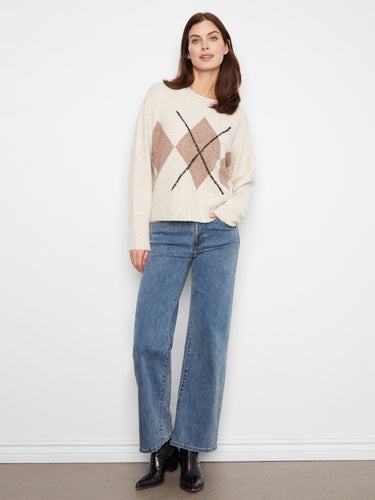 Cozy sweater featuring drop shoulders, enhancing its relaxed fit and casual elegance. By Charlie B.