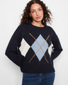 Sweater with a cozy crew neckline, featuring a stylish argyle pattern in blue and white. Perfect for casual outings by Charlie B.