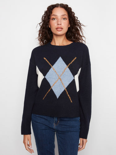 This sweater features a classic argyle pattern with contrasting colors, adding flair to your wardrobe essentials by Charlie B.