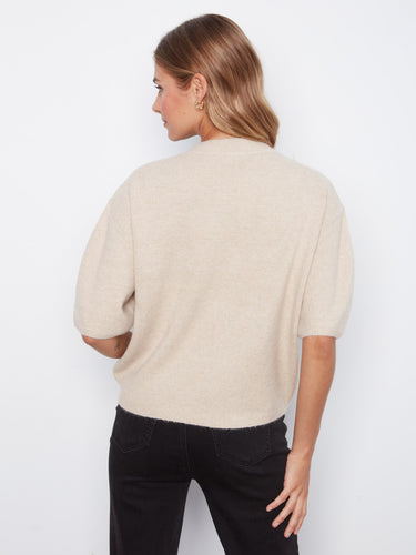 Designed with attention to detail, this sweater is both fashionable and functional for everyday wear. By Charlie B.