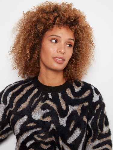 Crafted from soft brushed knit, this sweater offers ultimate comfort and warmth for cooler days. By Charlie B.