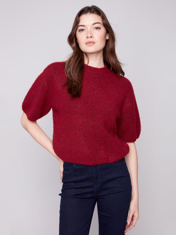 Cabernet knit sweater featuring a crew neckline and plush texture, perfect for cozy days by Charlie B.