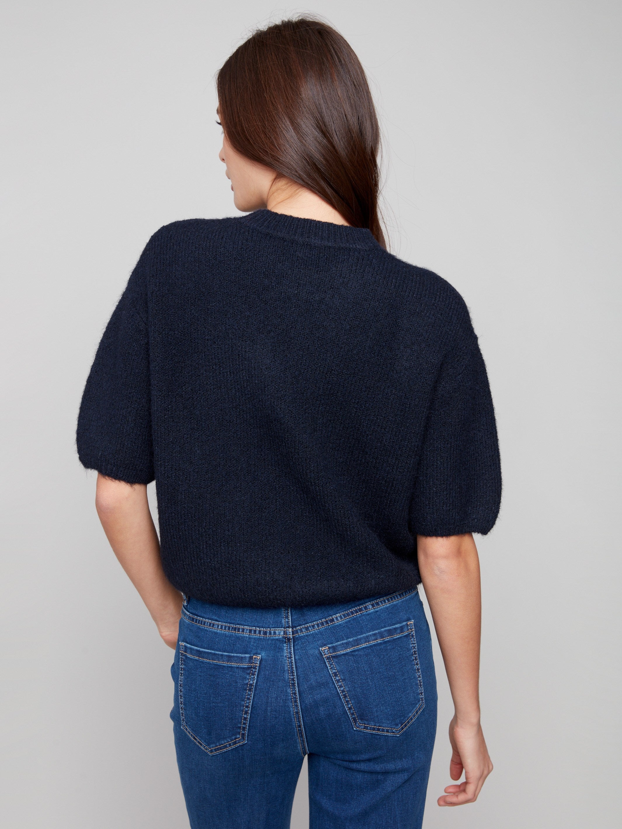 Moonlight knit sweater designed with balloon-shaped elbow sleeves for a modern twist on classic style by Charlie B.