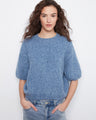 Blue knit sweater featuring a relaxed fit and mock neckline, perfect for casual outings by Charlie B.