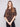 Leopard print sweater featuring plush knit texture and relaxed fit, perfect for cozy days by Charlie B.