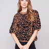 Leopard print sweater featuring plush knit texture and relaxed fit, perfect for cozy days by Charlie B.