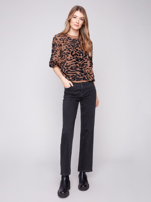 Stylish leopard knit with balloon-shaped elbow sleeves adds a trendy touch to any outfit by Charlie B.