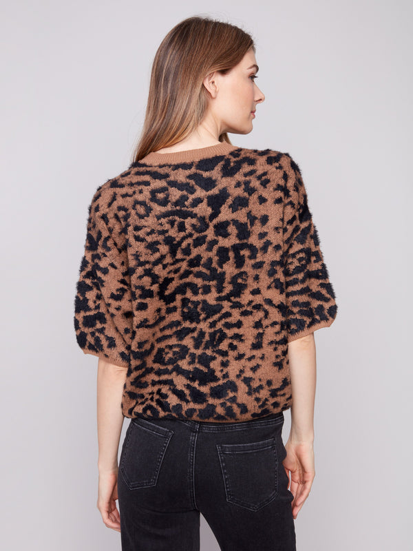 Elegant knit sweater with a unique leopard design and crew neckline for casual chic style by Charlie B.