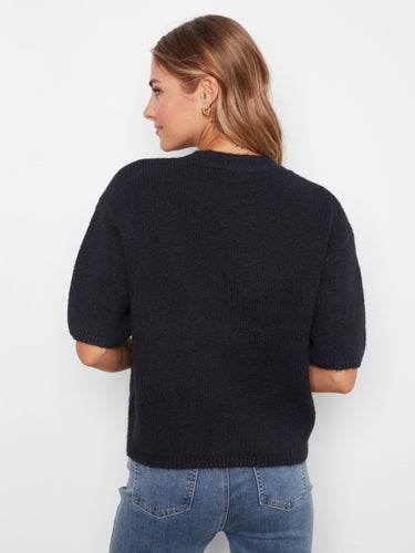 Enjoy the relaxed fit of this versatile sweater, ideal for layering or wearing on its own. By Charlie B.