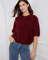 Charming burgundy sweater with unique balloon elbow sleeves, offering a stylish yet cozy feel by Charlie B.