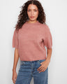 Elegant mock neck sweater with a soft brushed knit design, perfect for cozy days. By Charlie B.