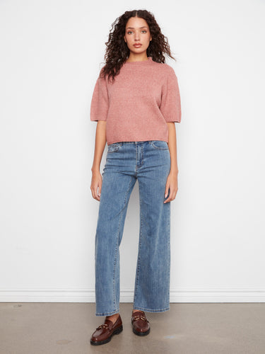 Mock neck detail enhances the stylish appeal of this versatile knit sweater. By Charlie B.