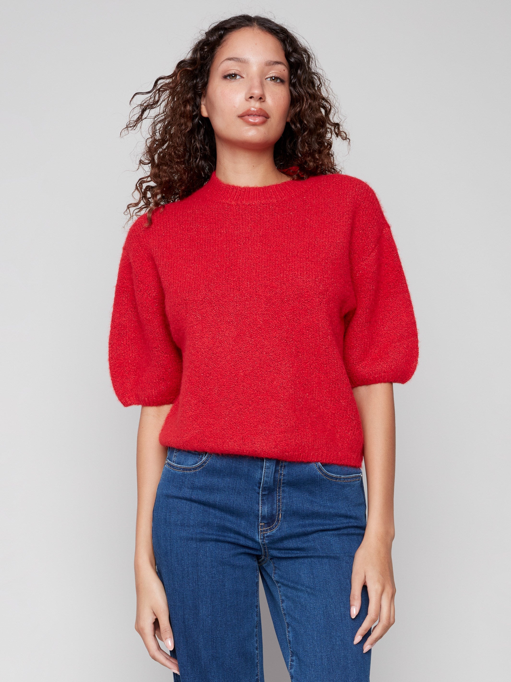 Crimson plush knit sweater featuring balloon-shaped elbow sleeves and elegant design by Charlie B.