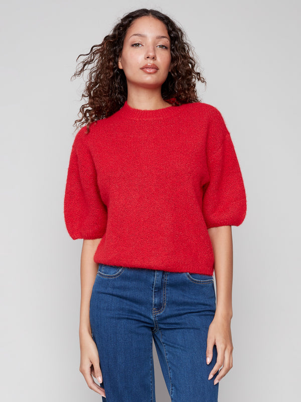 Crimson plush knit sweater featuring balloon-shaped elbow sleeves and elegant design by Charlie B.