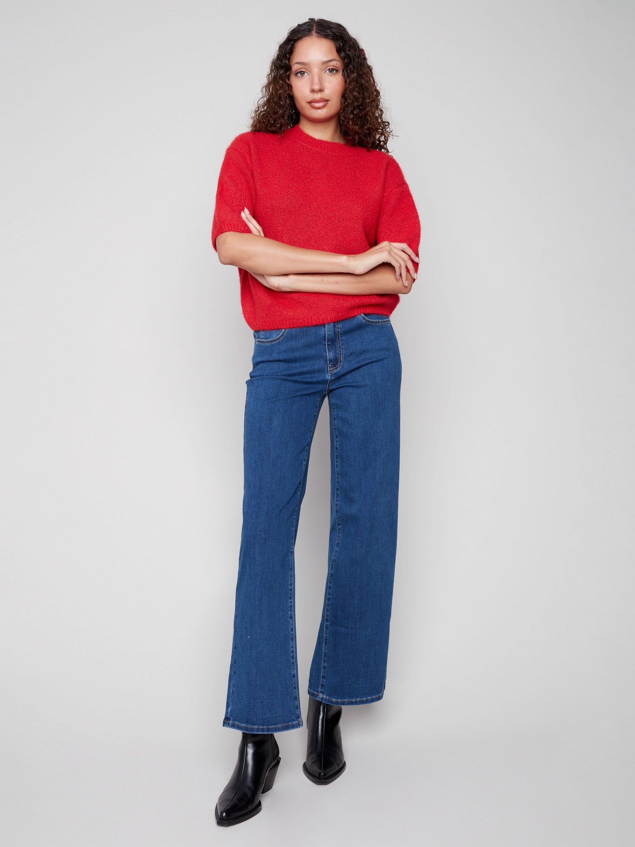 Chic crimson knit sweater with soft texture and relaxed silhouette for a modern look by Charlie B.