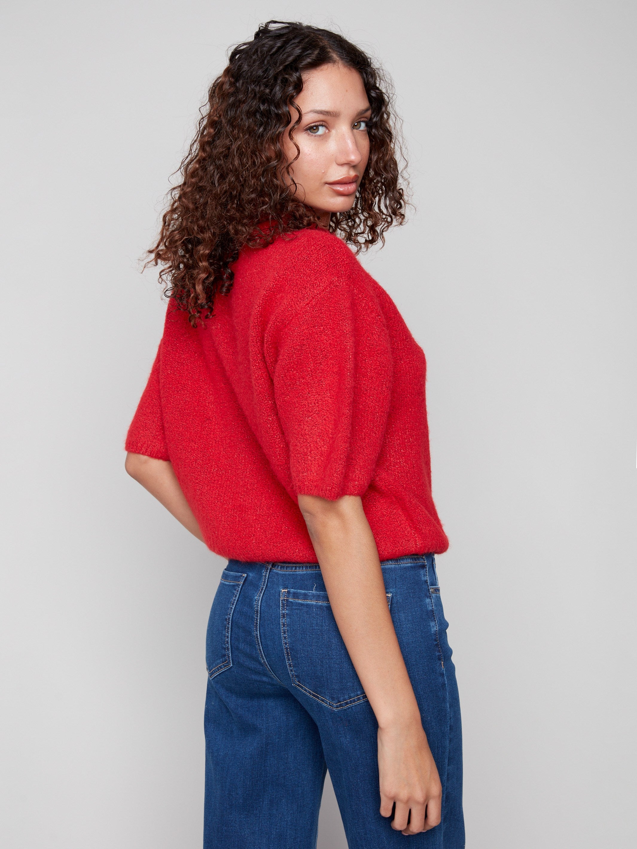 Elegant crimson sweater crafted from plush knit for a cozy yet fashionable appearance by Charlie B.