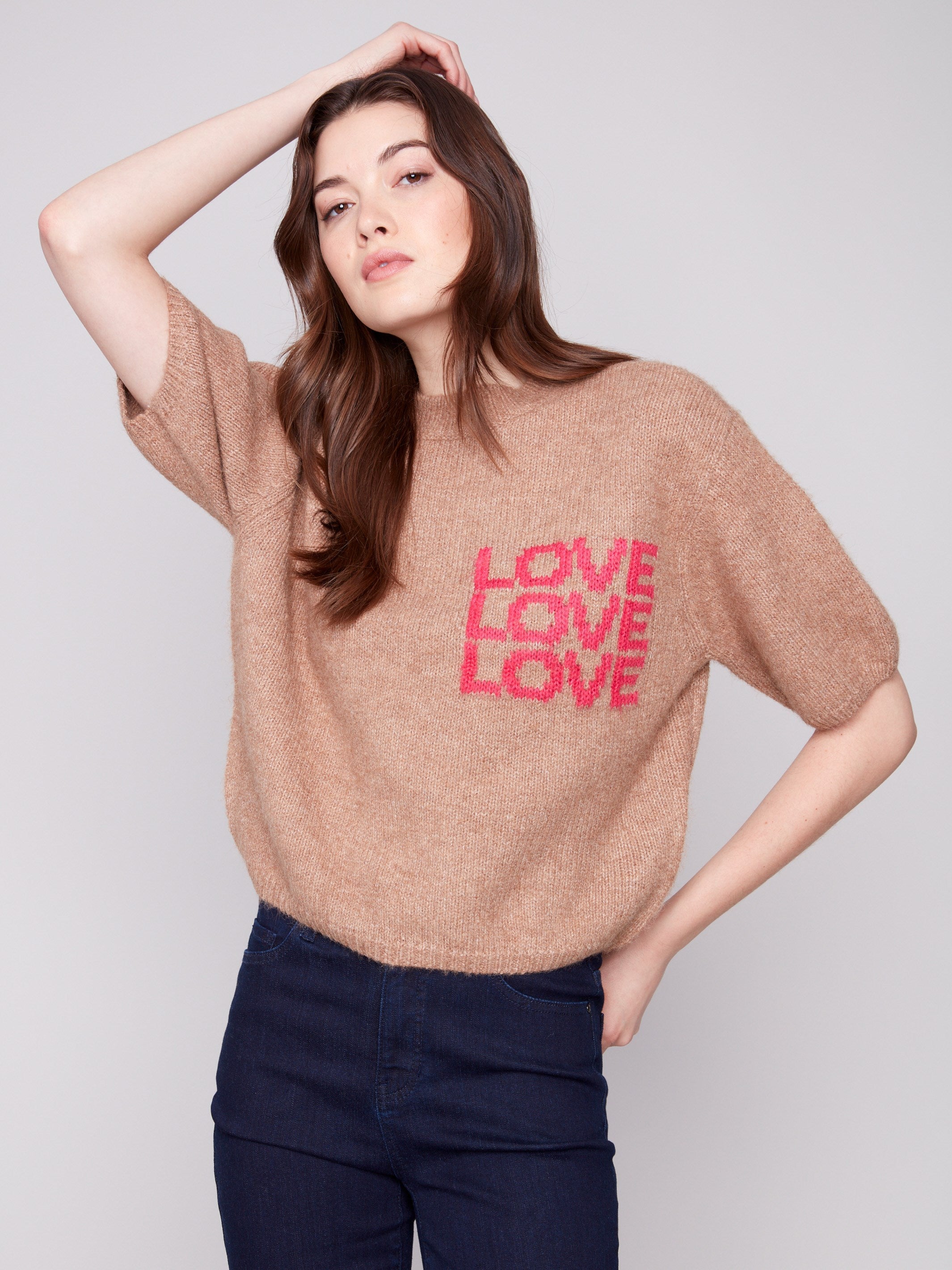 Truffle sweater with a crew neckline and graphic 'LOVE' text, perfect for casual outings by Charlie B.