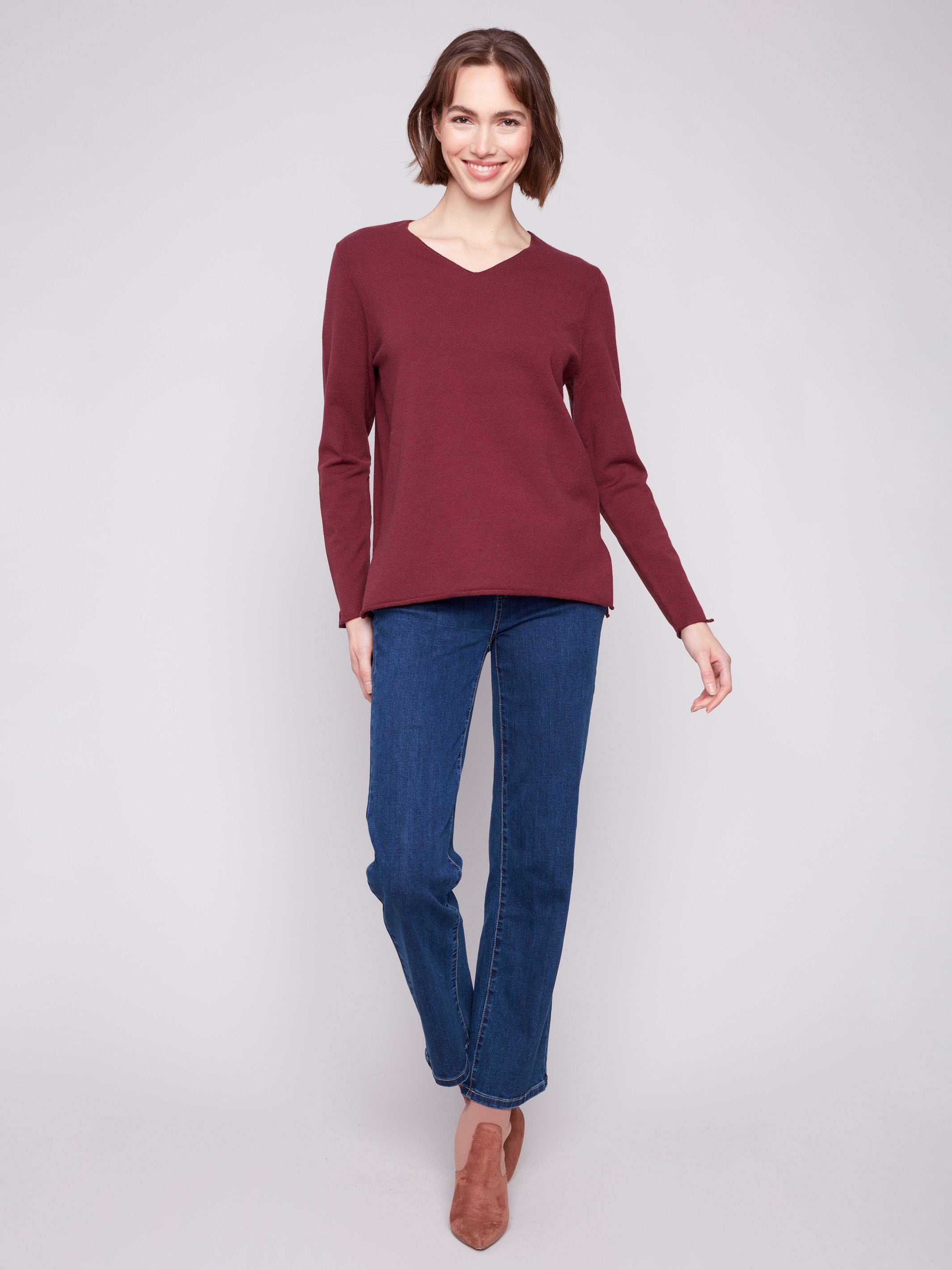 Elegant Cabernet sweater featuring side slits on sleeves and hem, designed for a relaxed fit by Charlie B.