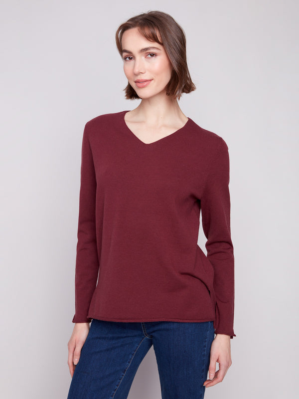 Classic Cabernet V-neck sweater with cozy long sleeves and plush texture, perfect for layering by Charlie B.