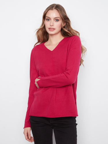 The versatile design of this top makes it suitable for various occasions, offering both style and comfort effortlessly. By Charlie B.