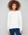 Ecru sweater with plush texture, featuring a V neckline and long sleeves. Classic fit adds to its timeless appeal by Charlie B.