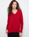 Red top with a flattering V-neckline, perfect for layering or wearing alone. Crafted in soft knit for comfort by Charlie B.