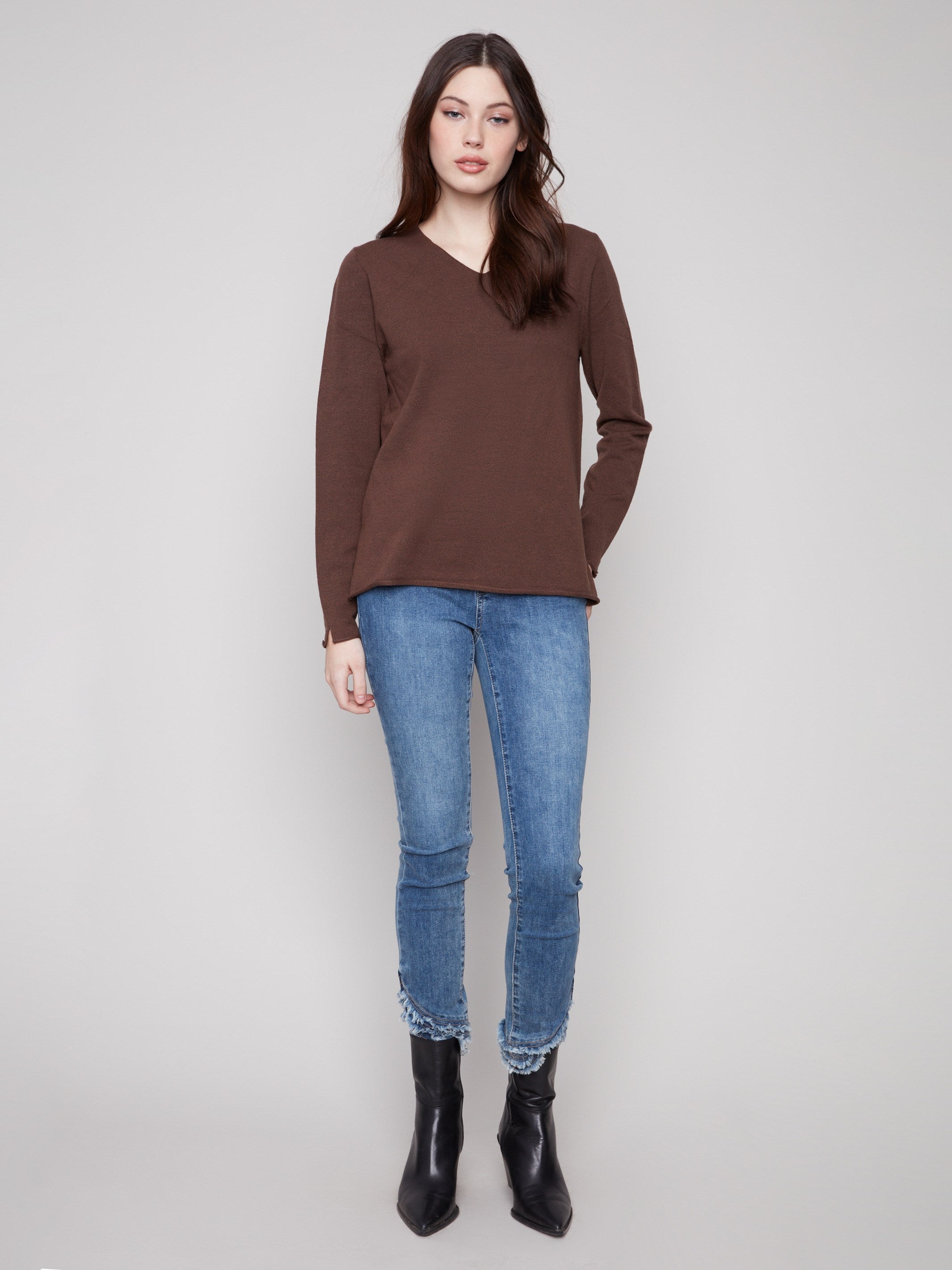 Elegant long-sleeve mocha sweater featuring side slits on sleeves and hem, ideal for a chic look by Charlie B.