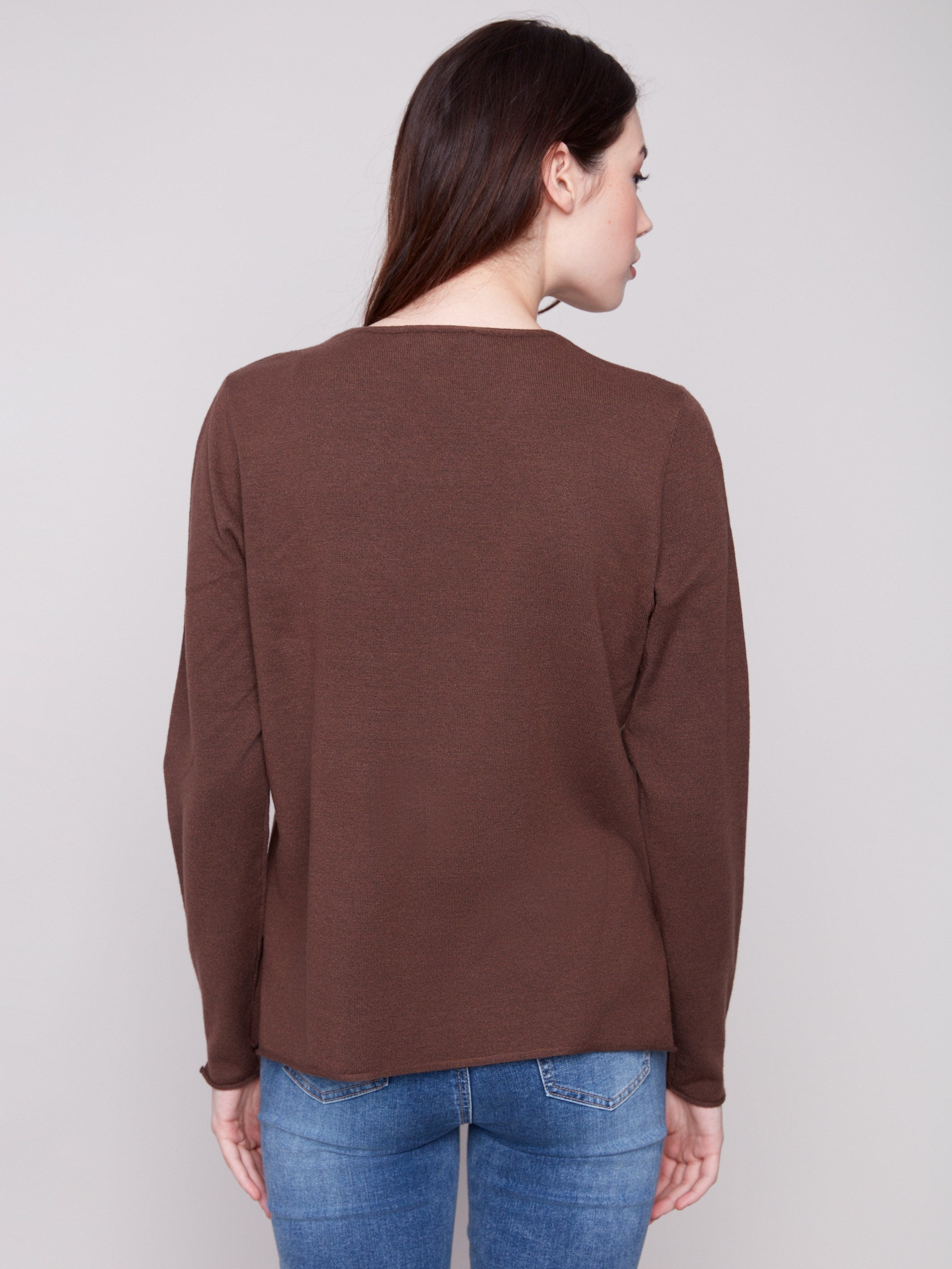 Stylish V-neckline sweater in heather mocha, showcasing timeless elegance and comfort by Charlie B.