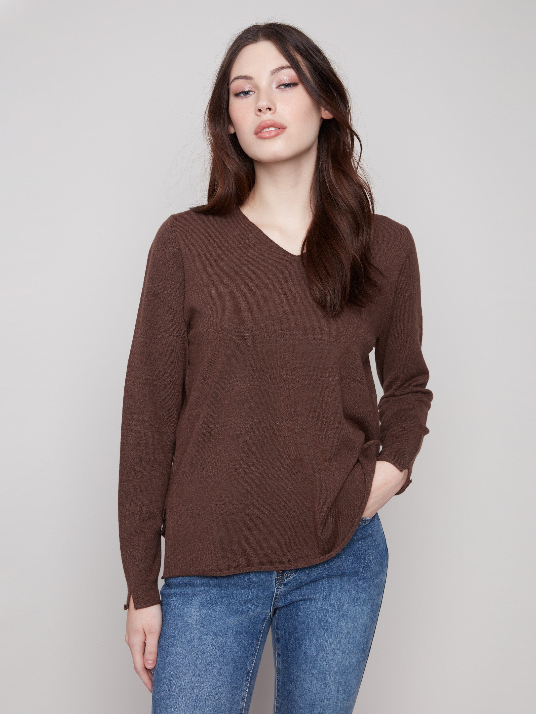 Mocha-colored sweater with a classic fit and side slits, offering both style and versatility by Charlie B.