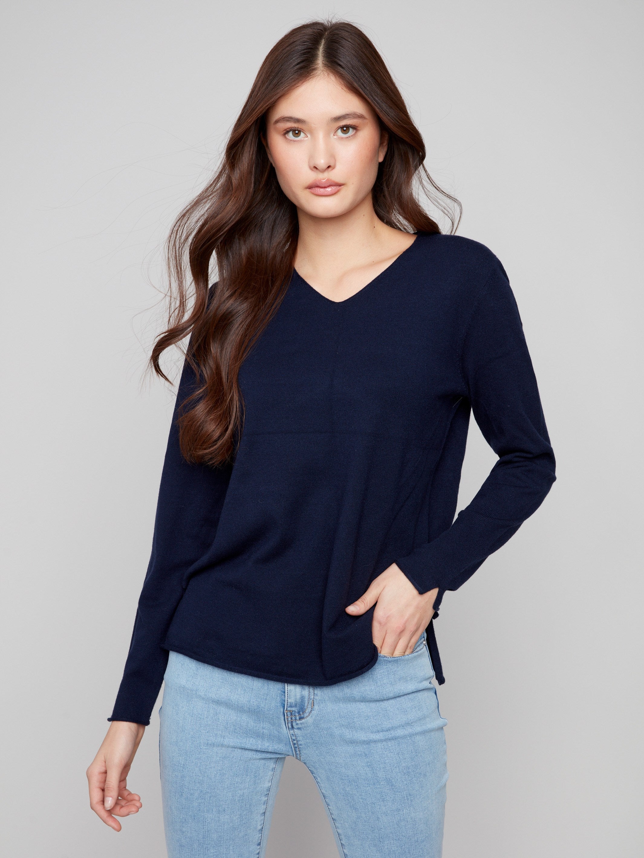 Navy sweater featuring a plush texture and classic fit, offering comfort and style for any occasion by Charlie B.
