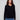 Black sweater with plush texture and refined V neckline, showcasing timeless style by Charlie B.