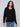 Stylish black V-neck sweater made from plush material, offering comfort and elegance by Charlie B.