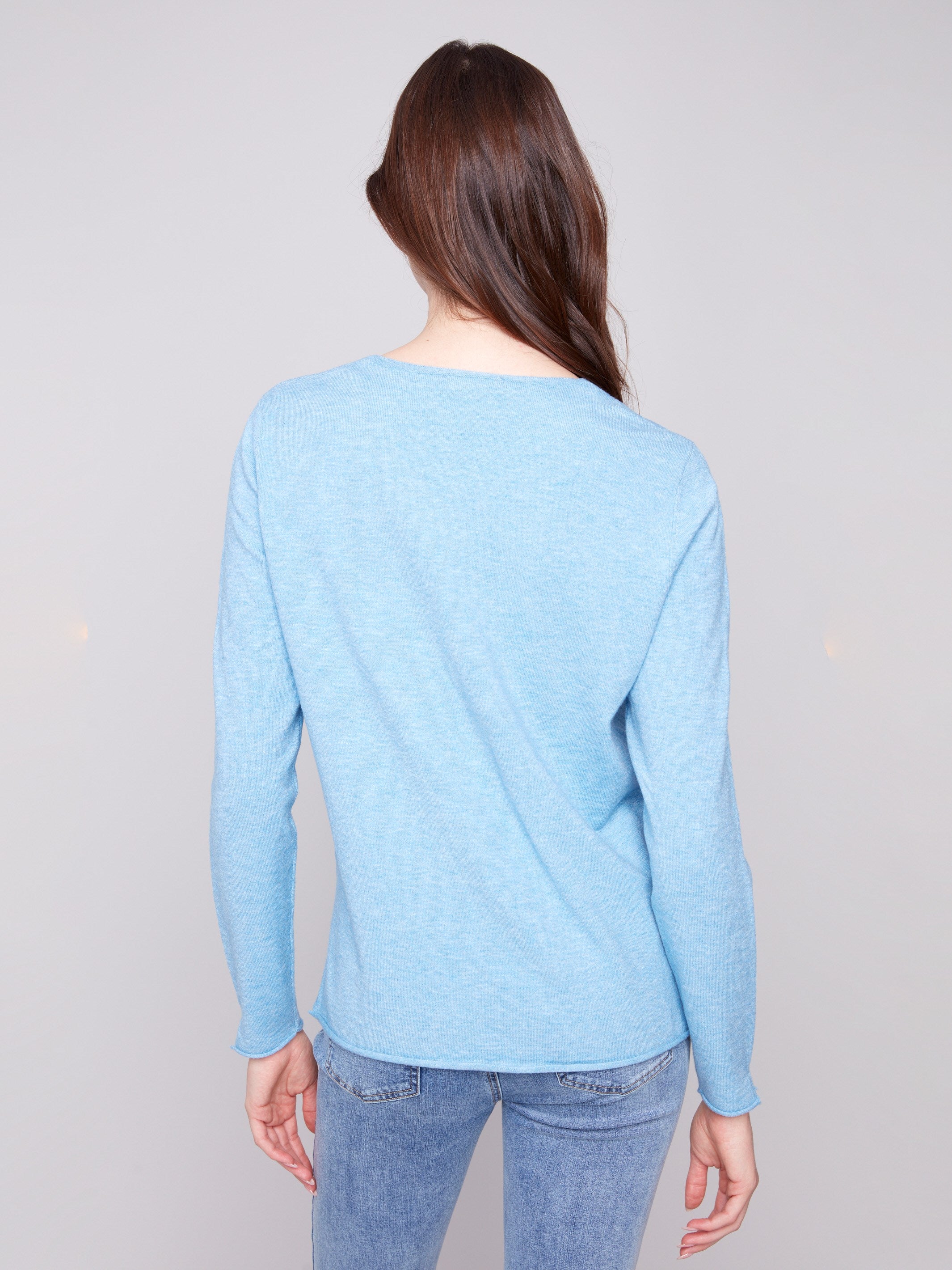 Soft plush sweater with V neckline, combining comfort and elegance effortlessly by Charlie B.
